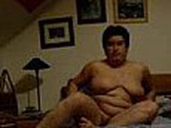 Well here's one more chubby mature mom taping herself during a masturbation session in this video clip. This babe fingers her pussy with as many fingers as she needs while showing off her enormous saggy tits