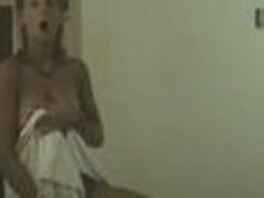 Lively honey looks so gorgeous after taking the shower! Her towel falls down and she stays nude before camera exposing perfect tiny boobs!